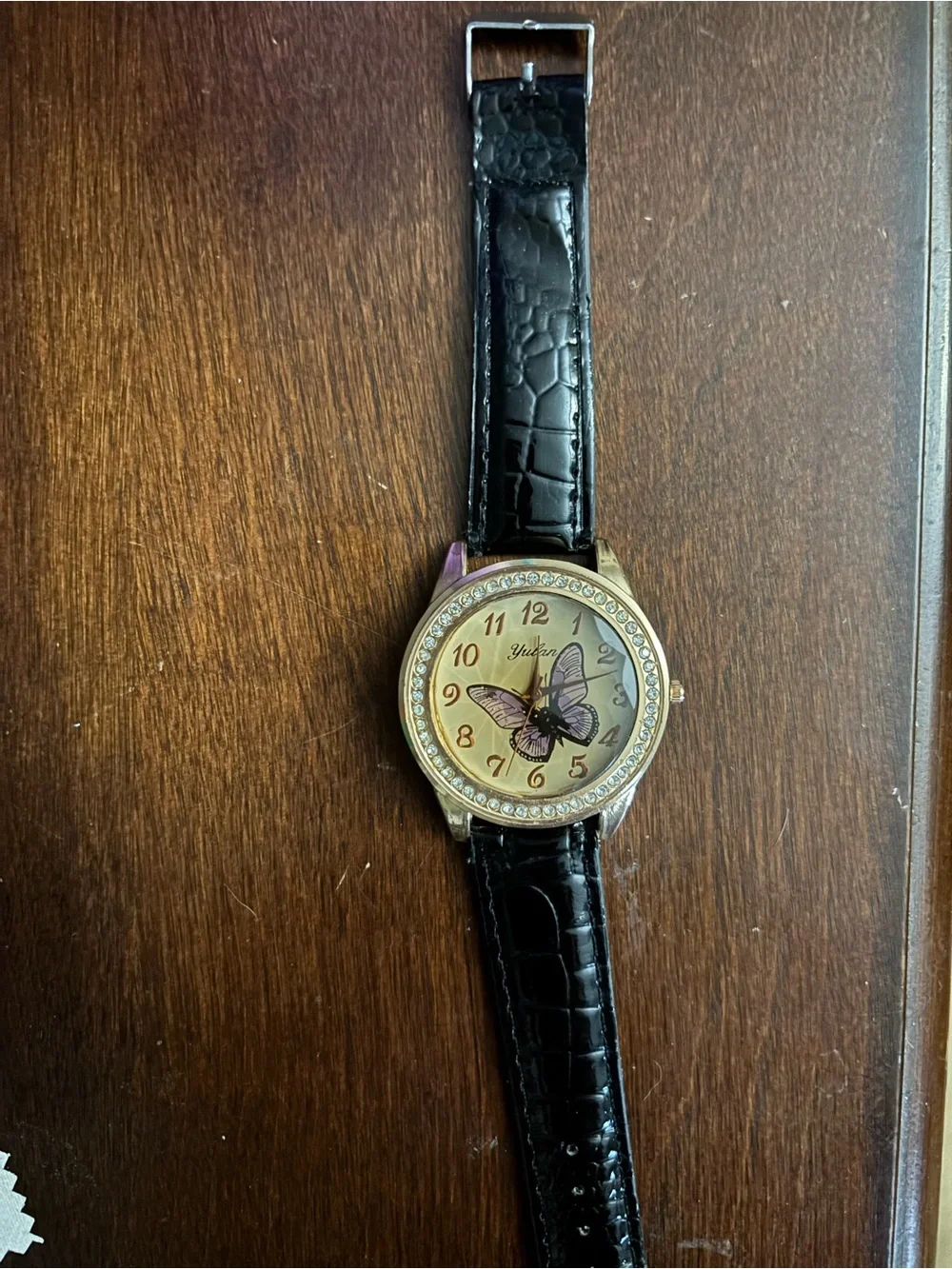 Women's Black Strap Butterfly Dial Watch with Crystal Bezel